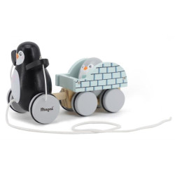Jucărie de tras din lemn Magni Pinguin cu iglu și ou Jucărie de tras din lemn Magni Pinguin cu iglu și ou